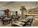 Bright restaurant dining area with modern table settings and decorative lighting, creating an inviting atmosphere at 1133 14Th St # 4150, Denver, CO 80202