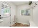 Mudroom with a coat rack, storage, a utility sink, and natural light at 1023 Hooker St, Denver, CO 80204