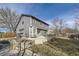 Back exterior view featuring a patio and well-maintained lawn at 11676 Josephine Cir, Thornton, CO 80233