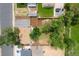 Overhead view displaying the layout of the property, adjacent homes, and mature trees at 5573 S Huron St, Littleton, CO 80120