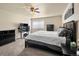 Main bedroom with desk workspace and ample natural light at 6631 E Ithaca Pl, Denver, CO 80237