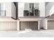 Modern townhouses with attached garages and private balconies at 2828 N Federal Blvd, Denver, CO 80211