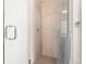 Clean shower with gray tile and hexagon floor at 2828 N Federal Blvd, Denver, CO 80211