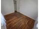 Simple bedroom showcasing hardwood floors and a closet at 475 Tennyson St, Denver, CO 80204