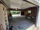 A spacious garage offers plenty of storage and workspace with a large open door at 475 Tennyson St, Denver, CO 80204