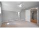 Spacious bedroom boasts a fan, neutral tones, and entryways to closet and hallway at 8721 E 23Rd Ave, Denver, CO 80238