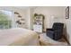 Comfortable bedroom features a large window and neutral tones to create a relaxing atmosphere at 11923 E Ford Dr, Aurora, CO 80012