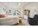 Serene bedroom with vaulted ceilings, soft lighting, and ample closet space at 11923 E Ford Dr, Aurora, CO 80012