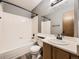 Bathroom with tub, sink, vanity, and neutral color palette at 5745 W Atlantic Pl # 207, Lakewood, CO 80227