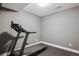 Home gym in basement with a treadmill, offering convenience for exercise and fitness routines at 2122 S Ogden St, Denver, CO 80210