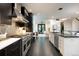 Bright kitchen with stainless steel appliances, modern cabinets and a spacious design at 1927 S Grant St, Denver, CO 80210