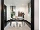 Bright home office featuring modern desk, stylish rug, and natural light from large windows at 1927 S Grant St, Denver, CO 80210