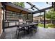 Covered outdoor kitchen with a dining area, perfect for grilling and enjoying meals al fresco at 1927 S Grant St, Denver, CO 80210