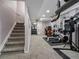 Spacious basement features a home gym area, perfect for fitness enthusiasts at 12061 Ivy Way, Brighton, CO 80602