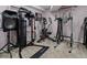 Home gym equipped with a variety of exercise machines for a complete workout experience at 12061 Ivy Way, Brighton, CO 80602