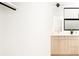 Clean bathroom with light wood vanity and a large mirror at 3433 Lawrence St # 1, Denver, CO 80205