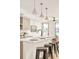 Modern kitchen with white countertops and an eat-in island at 3433 Lawrence St # 1, Denver, CO 80205