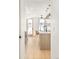 Clean lines and light wood cabinetry highlight this modern kitchen at 3433 Lawrence St # 1, Denver, CO 80205