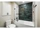 Bathroom with modern fixtures, stylish shower, and glass shower doors at 7221 S Brook Forest Rd, Evergreen, CO 80439