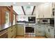 Modern kitchen with stainless steel appliances and stylish countertops at 7221 S Brook Forest Rd, Evergreen, CO 80439