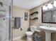 Basement bathroom with shower, sink, and updated fixtures at 10399 Zenobia Ct, Westminster, CO 80031