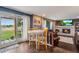 Kitchen dining area with access to the backyard at 10399 Zenobia Ct, Westminster, CO 80031