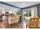 Kitchen with breakfast nook and view of backyard at 10399 Zenobia Ct, Westminster, CO 80031