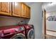 Convenient laundry room with Samsung washer and dryer at 10399 Zenobia Ct, Westminster, CO 80031