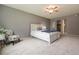 This is a cozy bedroom featuring a ceiling fan and walk-in closet at 710 S Clinton St # 3A, Denver, CO 80247