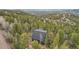 Secluded mountain home nestled in a lush forest with scenic views at 11390 Shimley Rd, Golden, CO 80403
