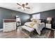 Cozy bedroom featuring plush rug, lots of pillows and a decorative mirror at 11390 Shimley Rd, Golden, CO 80403