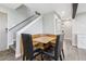 Cozy dining nook with booth seating, adjacent to the staircase at 11390 Shimley Rd, Golden, CO 80403