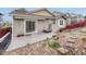 Well-kept backyard featuring a patio, sliding glass door, and landscaping at 2741 Poplar Grove Pl, Castle Rock, CO 80109