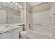 This is a full bath with tub, tile surround, and a neutral color scheme at 2741 Poplar Grove Pl, Castle Rock, CO 80109