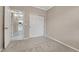 Carpeted bedroom features an entrance and a closet with sliding doors at 2741 Poplar Grove Pl, Castle Rock, CO 80109