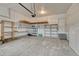 Spacious garage with ample storage shelving, organization, and overhead storage at 2741 Poplar Grove Pl, Castle Rock, CO 80109