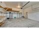 Organized garage space featuring shelving, overhead storage, and ample room at 2741 Poplar Grove Pl, Castle Rock, CO 80109