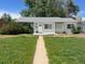 Charming single-story home with a well-maintained lawn and inviting entrance at 2815 S Dexter Way, Denver, CO 80222