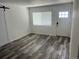 Spacious living area featuring updated flooring and natural light at 2815 S Dexter Way, Denver, CO 80222