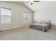 Spacious carpeted bedroom with ample natural light and vaulted ceilings at 3978 Aspen Hollow Ct, Castle Rock, CO 80104
