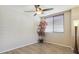 Clean, bright space, with a ceiling fan, wood floors, and a big window at 3978 Aspen Hollow Ct, Castle Rock, CO 80104