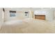 Open basement layout with bar area and access to the downstairs bathroom at 19061 E Powers Pl, Aurora, CO 80015