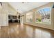 Open-concept living room boasts hardwood floors, vaulted ceilings, and an adjacent kitchen at 19061 E Powers Pl, Aurora, CO 80015