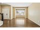 Bright and open living room with hardwood floors and a large window at 19061 E Powers Pl, Aurora, CO 80015