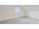 Bright bedroom with neutral carpet and a window providing natural light at 2572 Chase St, Edgewater, CO 80214