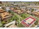 A lovely aerial view showcases a community with pool, tennis court, and mature trees at 540 S Forest St # 5-204, Denver, CO 80246