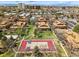 Aerial view of a residential community featuring beautiful landscaping, pool and tennis court at 540 S Forest St # 5-204, Denver, CO 80246