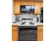 Updated kitchen featuring stainless steel appliances, stylish cabinetry, and a clean, modern design at 540 S Forest St # 5-204, Denver, CO 80246