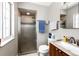 Neutral bathroom showcasing a glass door shower, large mirror, and stylish fixtures at 41020 Us Highway 36, Bennett, CO 80102