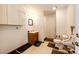 Well-lit bathroom featuring a tiled floor, vanity and toilet at 41020 Us Highway 36, Bennett, CO 80102